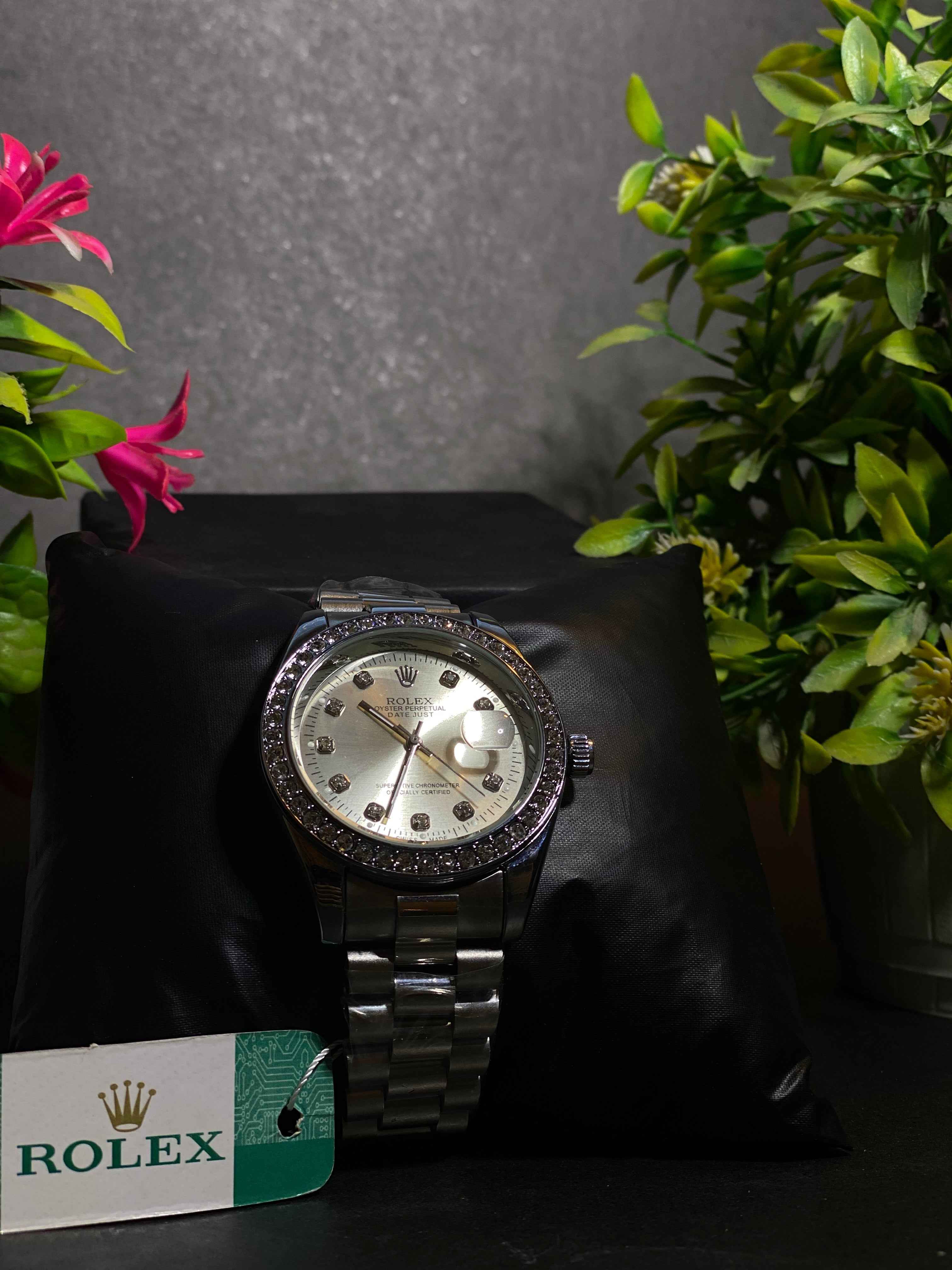 Elegant Silver Watch with Diamond Accents in Display Box