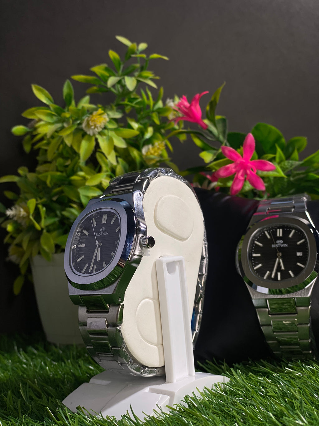 Modern Stainless Steel Watch with Black Textured Dial Display