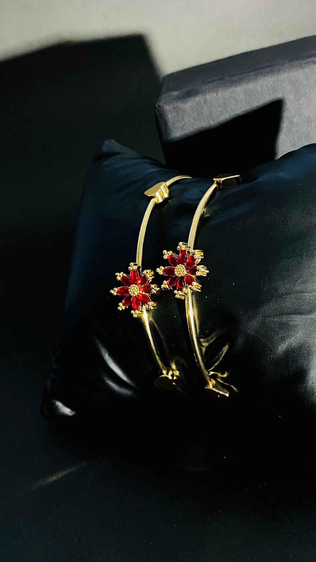 Elegant Gold Bangles with Red Floral Gemstone Design