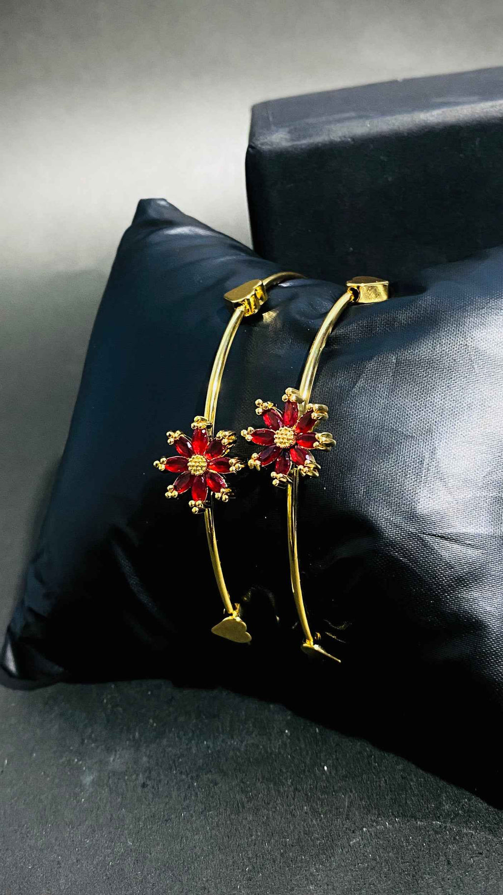 Elegant Gold Bangles with Red Floral Gemstone Design