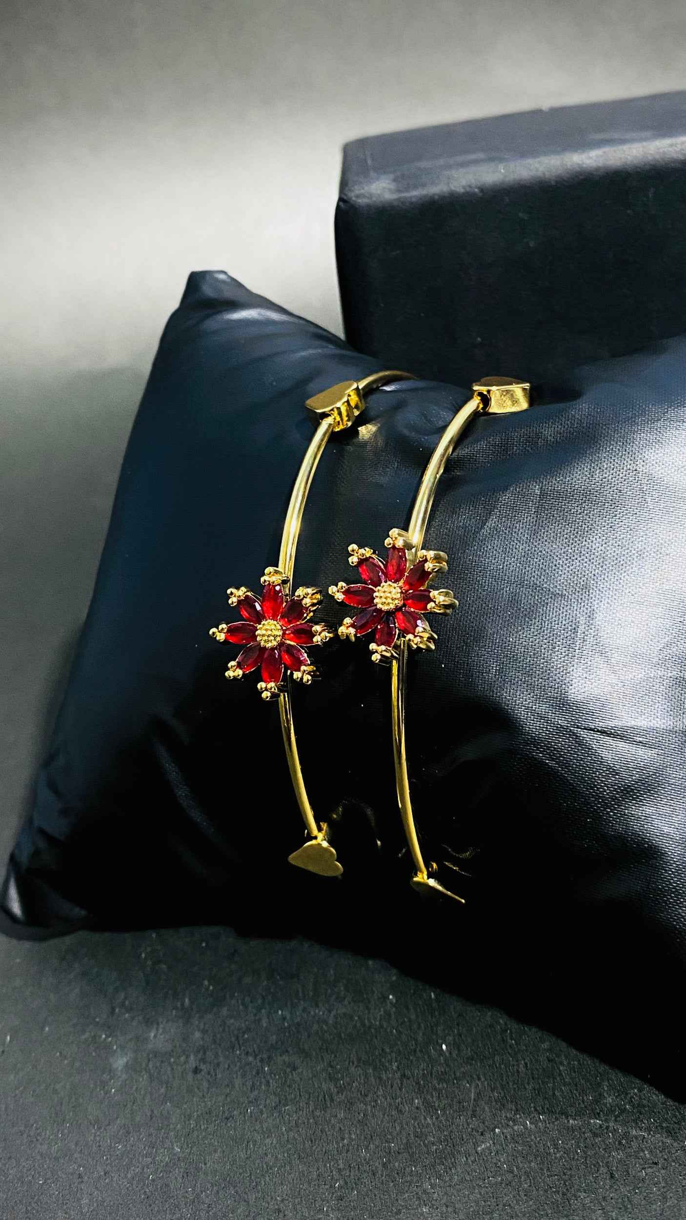 Elegant Gold Bangles with Red Floral Gemstone Design