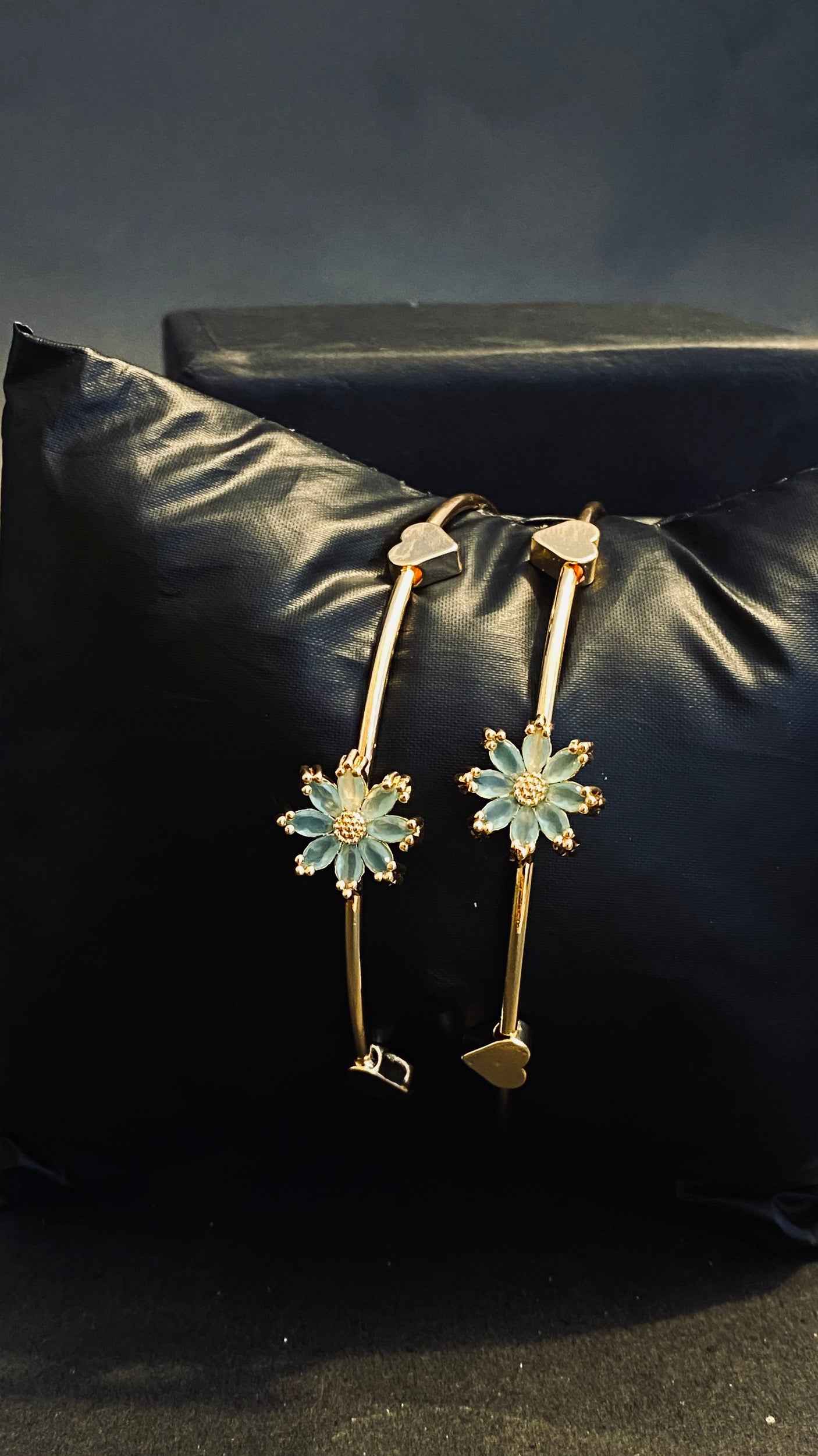 Elegant Gold Bangles with Pastel Blue Floral Gemstone Accents