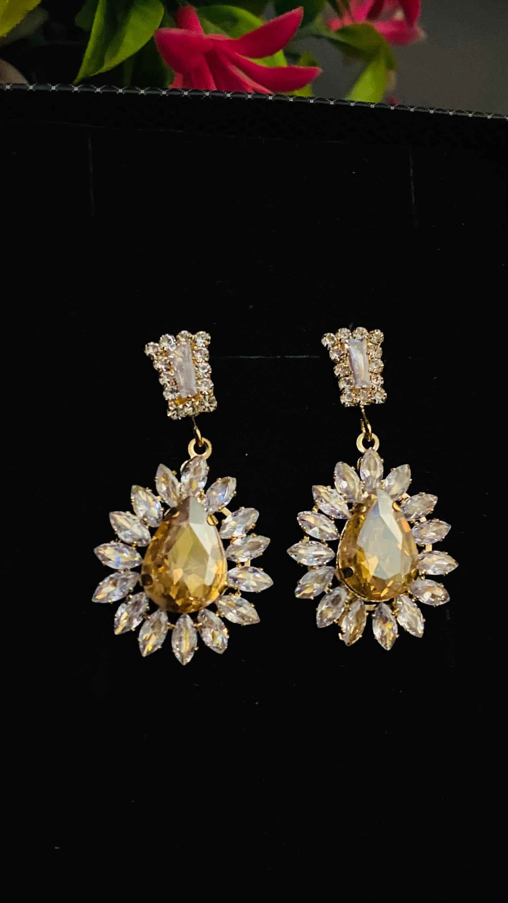 Royal Teardrop Earrings with Crystal Sunburst Design